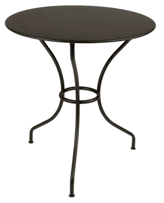 Fermob OPÉRA+ outdoor metal table with 67 cm diameter, suitable for patio or restaurant setting, shown on a patio surface