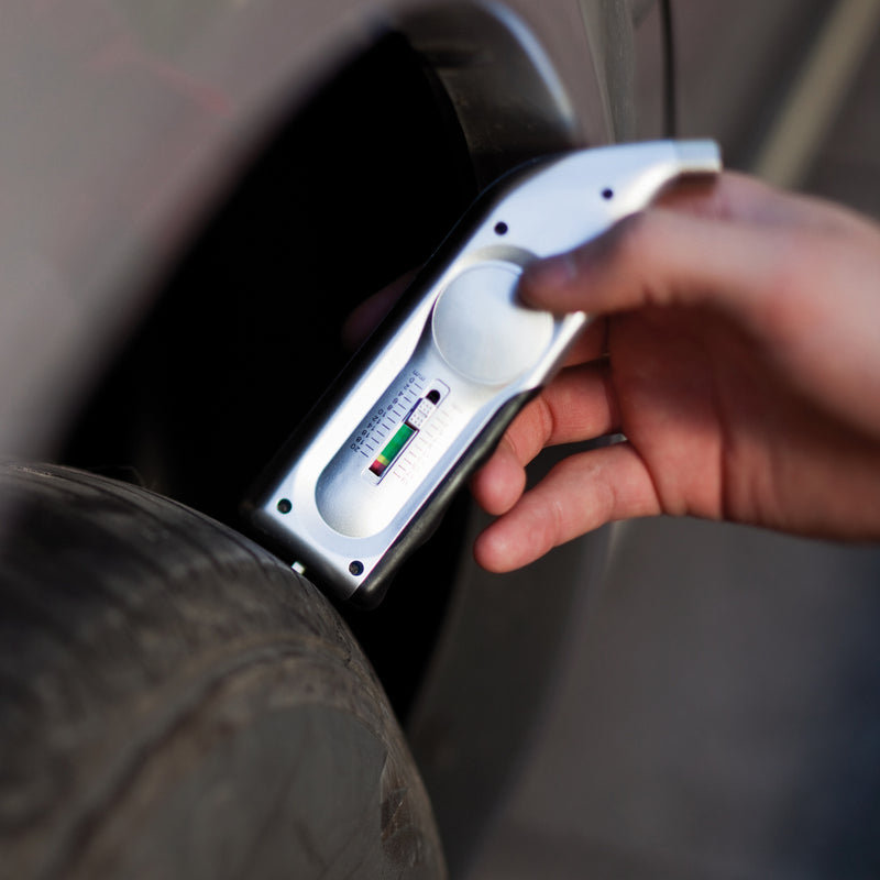 Load image into Gallery viewer, Digital tyre gauge from XD Collection for car safety, showing a close-up of the digital display and measurement buttons.
