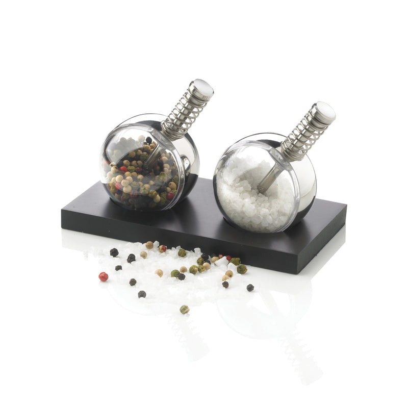 Load image into Gallery viewer, XD Design Planet pepper and salt set for home and kitchen, featuring stylish, round containers with black and white caps.
