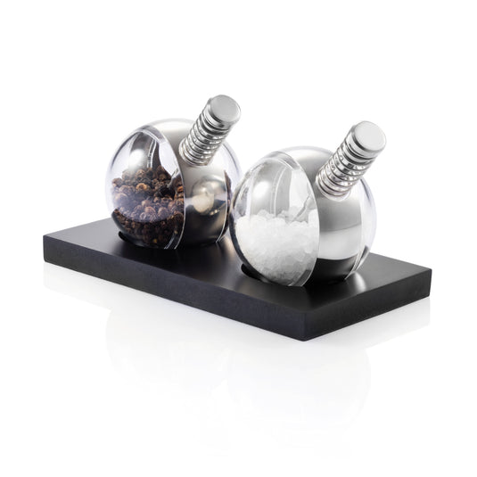 XD Design Planet pepper and salt set for home and living, featuring stylish globe-shaped shakers on a sleek tray.