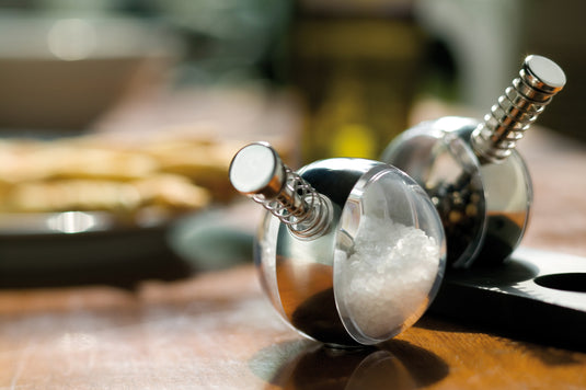 XD Design Planet pepper and salt set for home and living, featuring modern, spherical salt and pepper shakers with a sleek design.