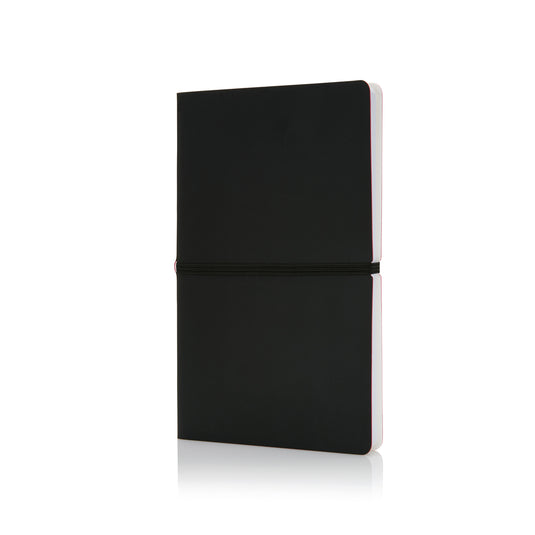 Deluxe softcover A5 notebook from XD Collection with smooth black cover and visible binding, ideal for note-taking and journaling.