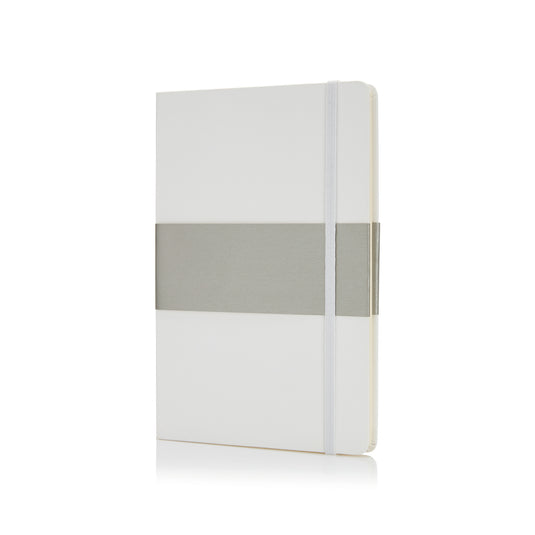 Deluxe hardcover A5 notebook from XD Collection with a sleek black cover and rounded corners, open to show lined pages inside.