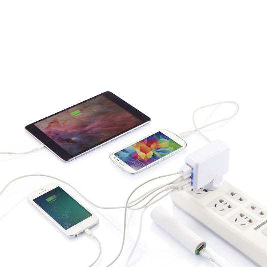 XD Collection travel plug with 4 USB ports for charging phones and tablets, compact and portable accessory for travel.