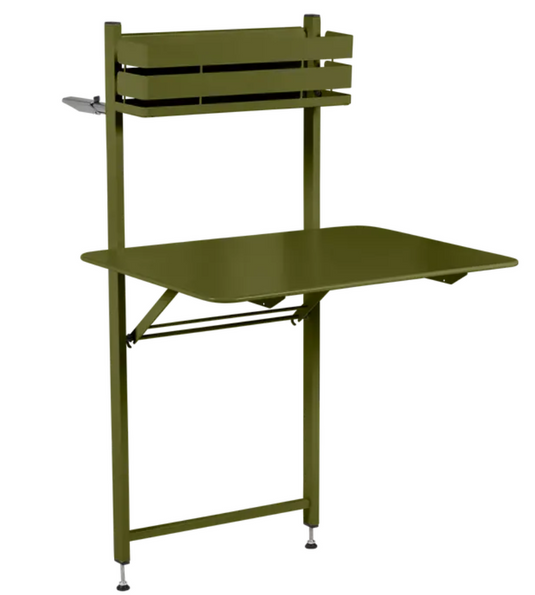 Pesto green Fermob foldable balcony table with metal frame, ideal for outdoor or apartment balcony seating.