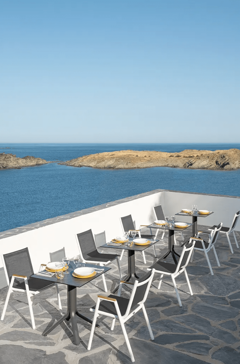 Load image into Gallery viewer, Pilotis V Batyline Armchair Teak - Custom Wood DesignsFermob Pilotis V Batyline teak armchair with woven Batyline fabric, designed for outdoor restaurant or hotel seating.Teak Batyline Armchair24575194742039
