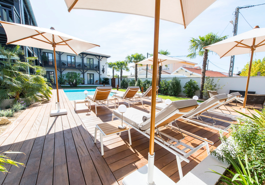 Pilotis V. Teak Sunlounger - Custom Wood DesignsFermob Pilotis V. Teak Sunlounger with slatted teak design, ideal for poolside relaxation or outdoor lounging.Teak Sunlounger Fermob24575195975927