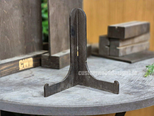 Plate Stands X 10 - Custom Wood DesignsSet of 10 wooden plate stands by Custom Wood Designs, displaying plates securely for display or storage.Plate Stand24575223634807