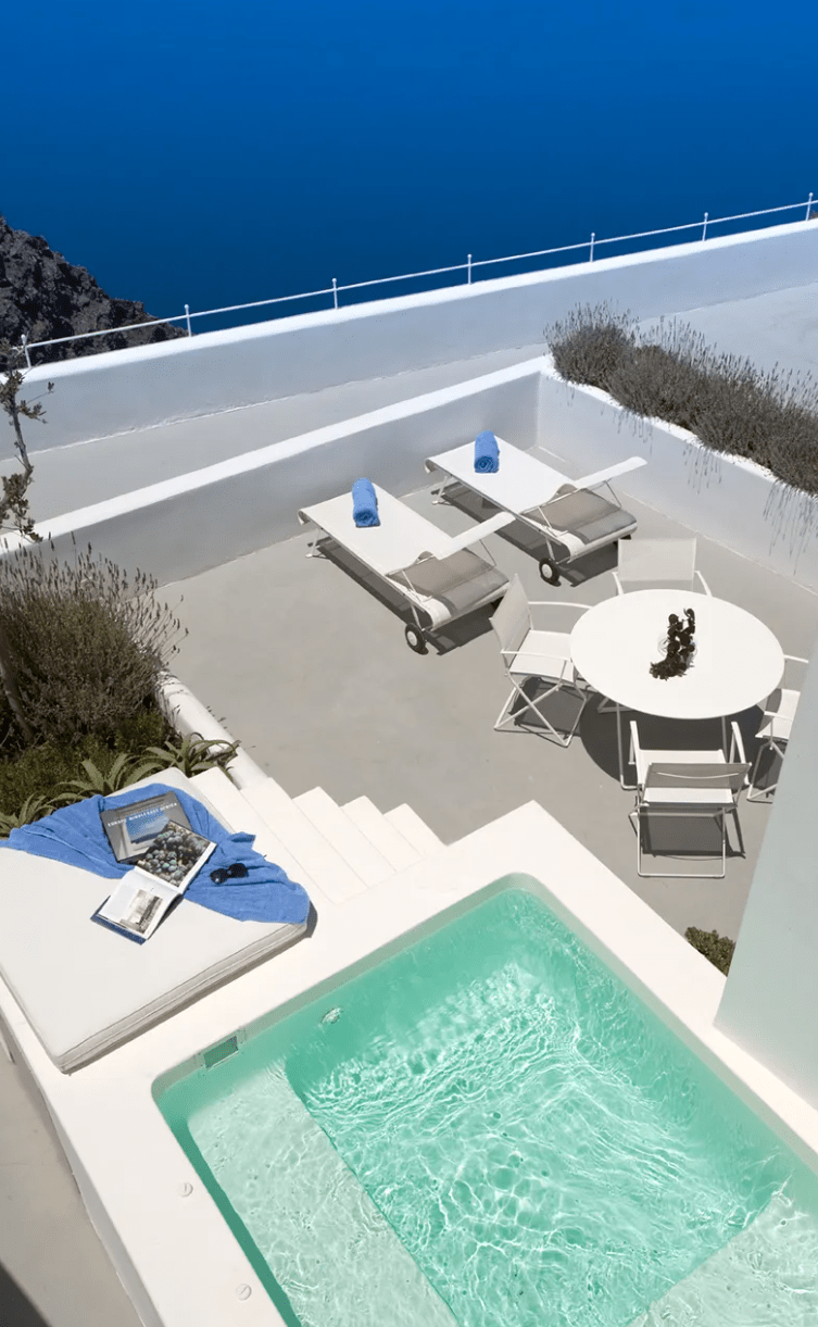 Load image into Gallery viewer, Fermob Plein Air Armchair folding chair in vibrant outdoor fabric with a sleek, modern design and sturdy metal frame.
