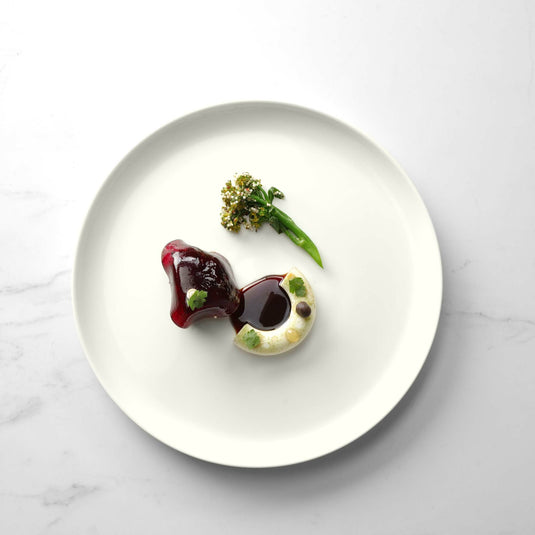 Deep white plate with high rim, 300mm diameter, from Fine Dine, designed for serving main courses or salads.