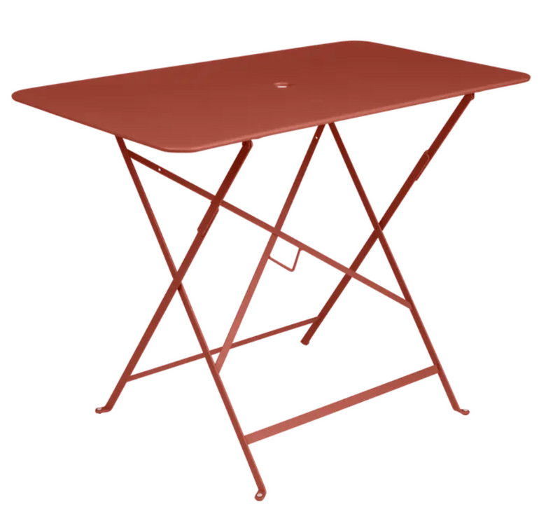 Load image into Gallery viewer, Red ochre Fermob metal foldable bistro table with 97x57 cm size, suitable for outdoor cafe or patio use.

