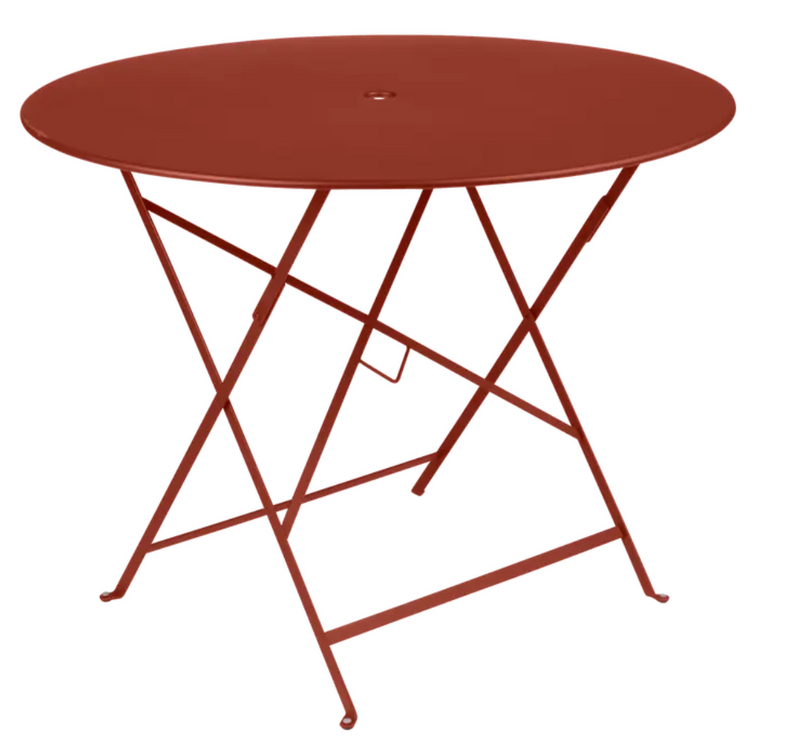 Load image into Gallery viewer, Red Fermob Bistro Round Table with a central parasol hole, suitable for outdoor restaurant or patio use.
