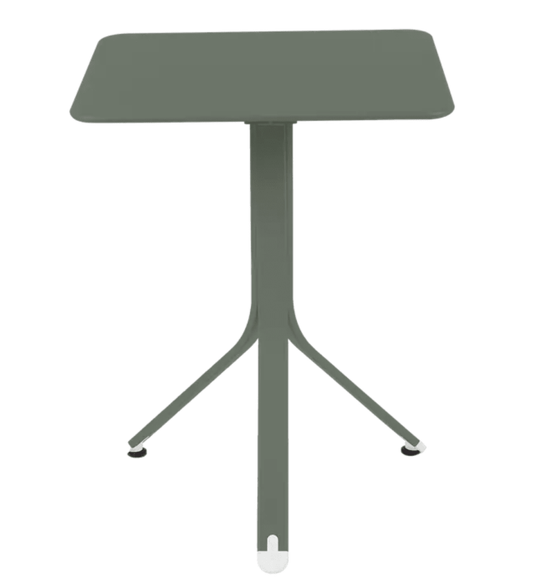 Load image into Gallery viewer, Rest'O Folding Table 57x57cm - Custom Wood DesignsFermob Rest'O folding outdoor table in metal, 57x57cm, shown in a small outdoor setting with a rosemary plant nearbyFermob Outdoor Table Metal24575200444119Rosemary
