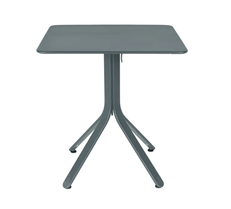 Load image into Gallery viewer, Rest'O Folding Table 71x71cm - Custom Wood DesignsStormGrey Fermob Rest'O folding outdoor metal table, 71x71cm, featuring a compact design and sturdy metal construction.Fermob Outdoor Table Metal24575202777367Storm Grey
