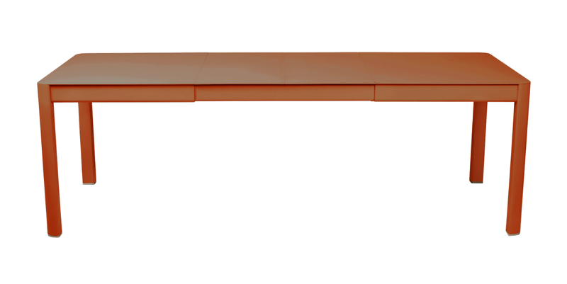 Load image into Gallery viewer, Fermob Ribambelle extendable metal table in Candied Orange, outdoor 10-seater large expandable aluminum dining table.
