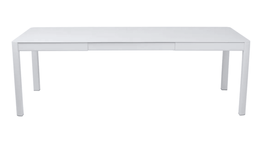 Fermob Ribambelle extendable metal table in white, large 10-seater outdoor hospitality table with aluminum extension.