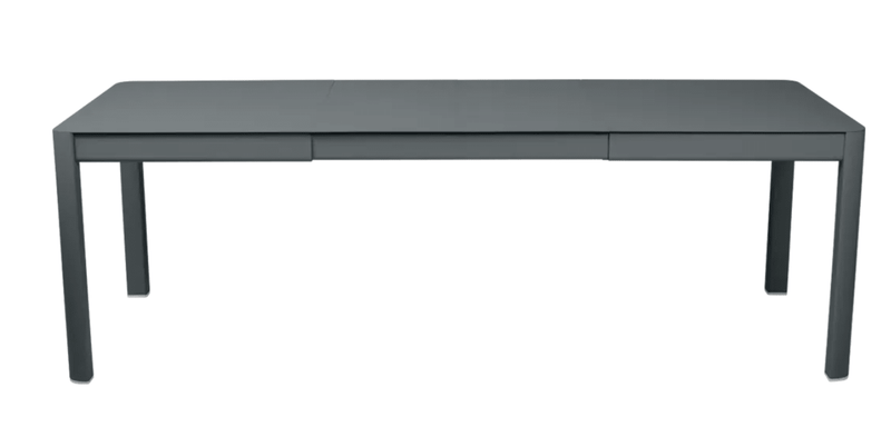 Load image into Gallery viewer, Fermob Ribambelle extendable metal table in storm grey, outdoor 10-seater with aluminum surface, ideal for hospitality spaces.
