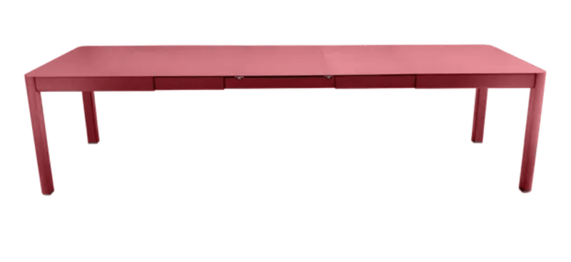 Load image into Gallery viewer, Chilli Red Fermob Ribambelle XL extendable metal table, large 14-seater hospitality table, open to show extendable design and sturdy construction.
