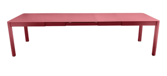 Chilli Red Fermob Ribambelle XL extendable metal table, large 14-seater hospitality table, open to show extendable design and sturdy construction.