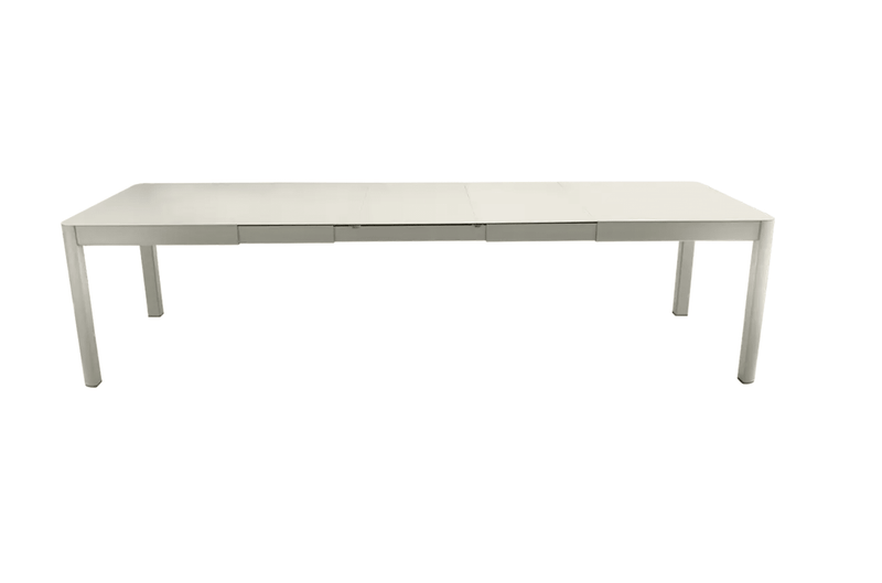 Load image into Gallery viewer, Large Fermob Ribambelle XL extendable metal table with 14 seats, ideal for hospitality and large gatherings.
