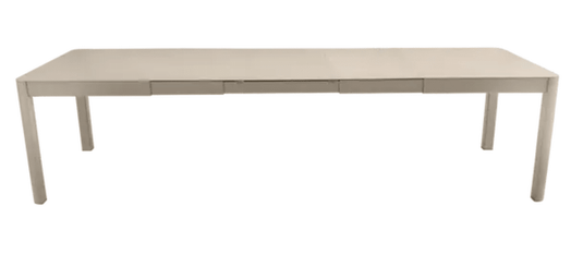 Fermob Ribambelle XL extendable metal table in nutmeg beige, 14-seater, large expandable hospitality table with metal construction.
