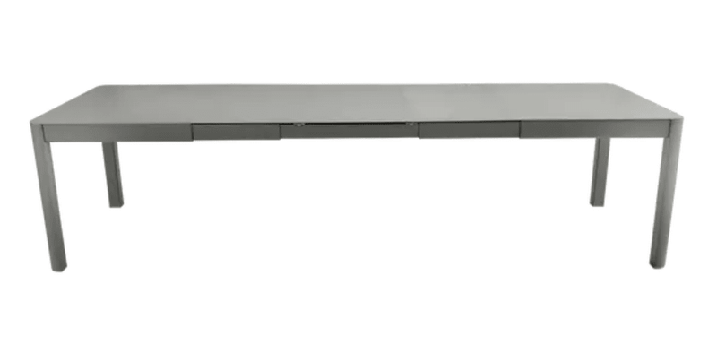 Load image into Gallery viewer, Fermob Ribambelle XL extendable metal dining table in rosemary color, large 14-seater hospitality furniture for gatherings.

