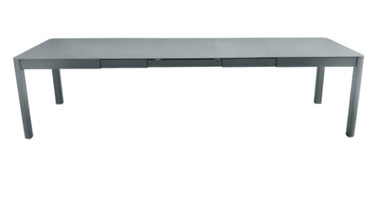 Large Fermob Ribambelle XL extendable metal table in Storm Grey, 14-seater, ideal for hospitality and large gatherings.