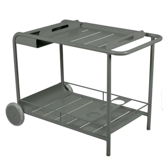 Fermob Luxembourg Side Bar trolley with wheels, used for restaurant terrace drinks service, featuring a sleek design and mobility.