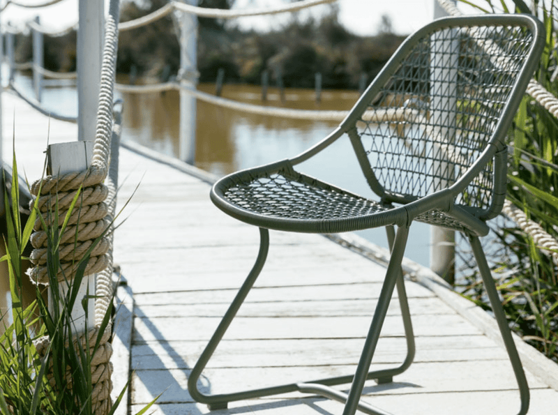 Load image into Gallery viewer, Stackable Fermob Sixties outdoor chair with cactus green finish, designed for restaurant and hospitality seating in Ireland.
