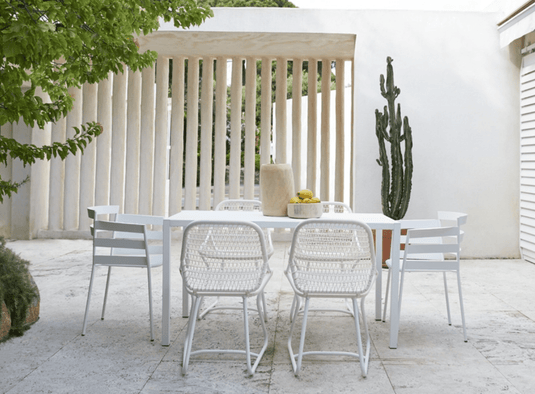 Cotton white Fermob Sixties outdoor stackable chair for restaurant and hospitality seating in Ireland.