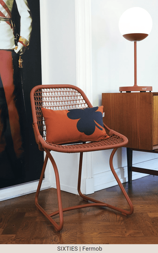 Red Ochre Fermob Sixties outdoor stackable chair, ideal for restaurant and hospitality seating in Ireland.