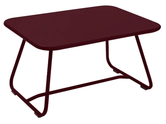 Black Cherry Fermob Sixties low outdoor table measuring 76x55.5cm, stylish and compact for outdoor patio or garden use.