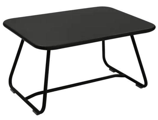 Fermob Liquorice Sixties low outdoor table with 76x55.5cm surface, ideal for garden or patio seating areas.