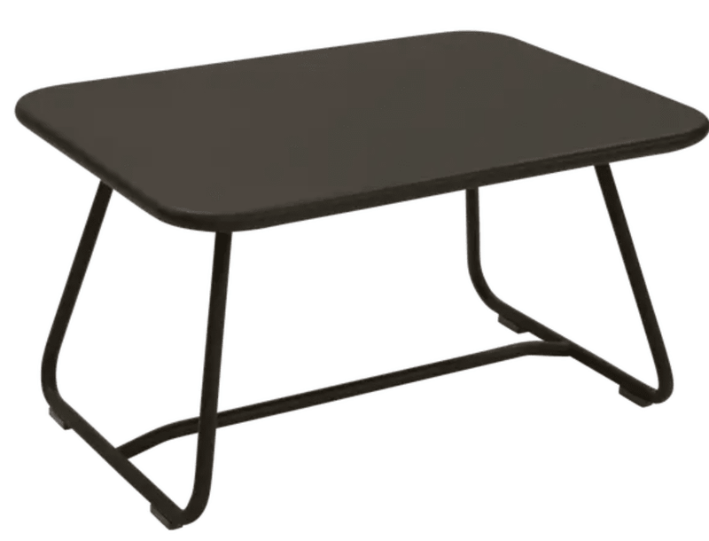 Load image into Gallery viewer, Fermob Sixties Low Outdoor Table in vibrant color, measuring 76x55.5cm, suitable for patio or garden seating areas.
