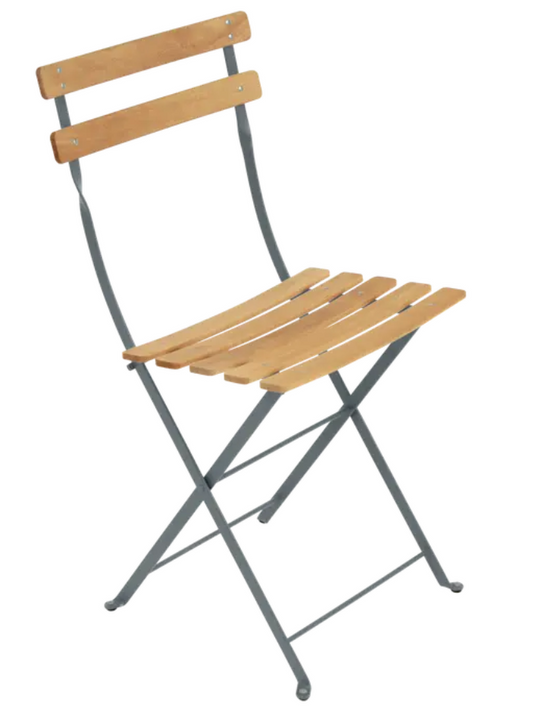 Storm grey Fermob Bistro Natural folding chair with wooden seat and metal frame, ideal for outdoor dining and patio furniture.