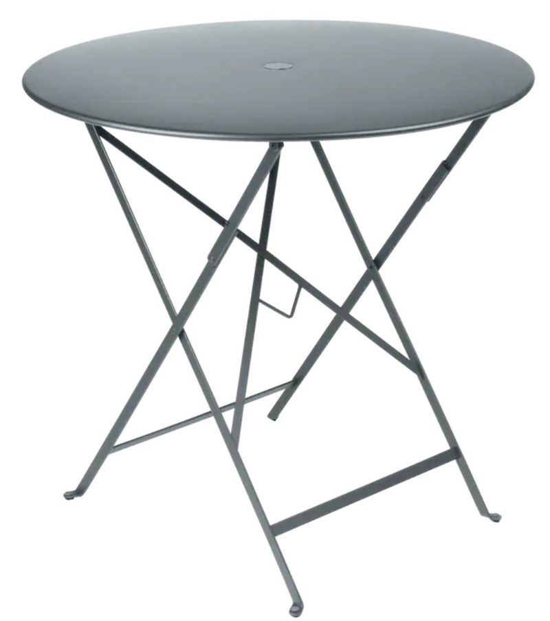 Load image into Gallery viewer, Fermob Storm Grey 77cm round outdoor bistro table with folding metal design, ideal for small outdoor dining or cafe spaces.
