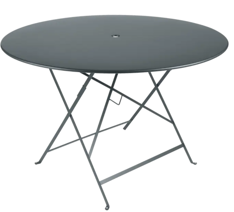 Load image into Gallery viewer, Storm grey Fermob round bistro table, Ø117cm, six-seater with folding design, Parisian style for outdoor dining.
