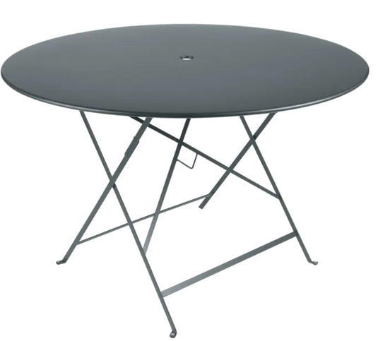 Storm grey Fermob round bistro table, Ø117cm, six-seater with folding design, Parisian style for outdoor dining.