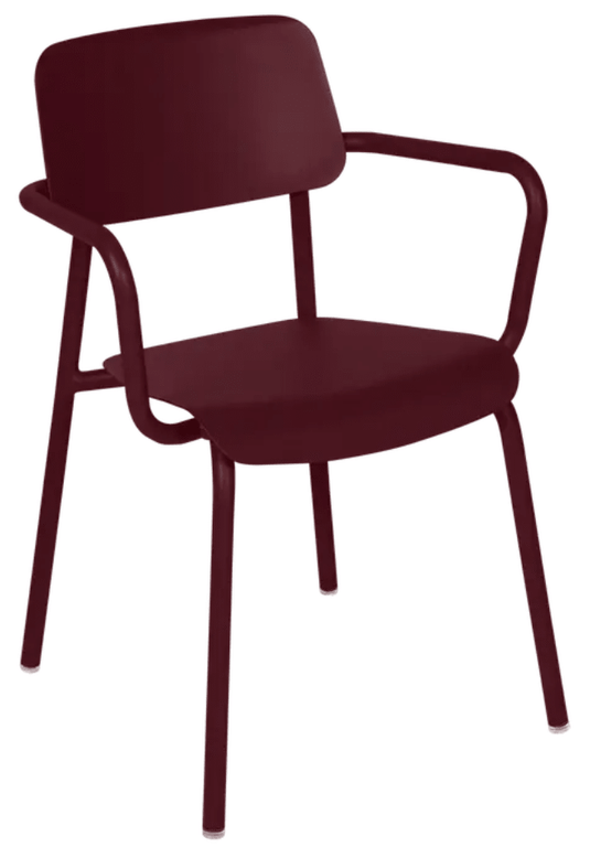 Black Fermob Studie armchair, stackable contract dining and office chair with a sleek, modern design, suitable for indoor use.