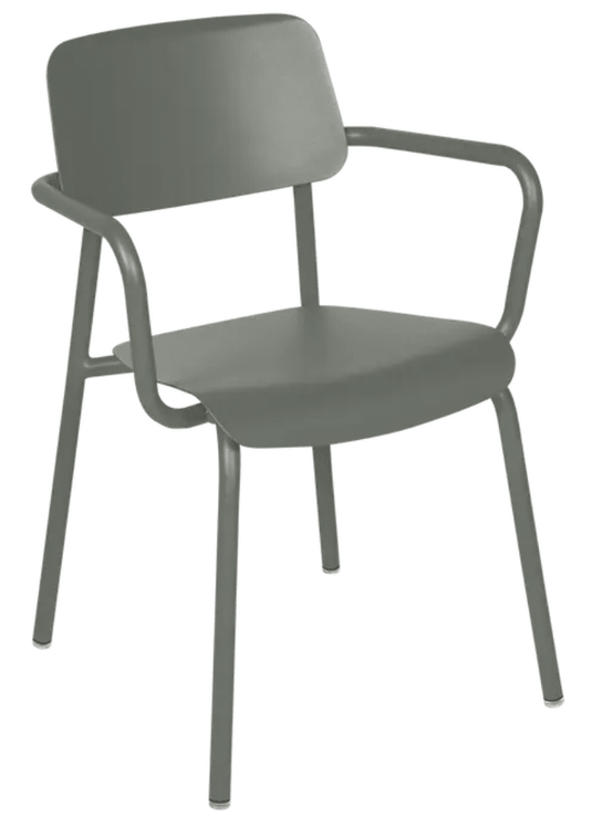 Fermob Study Armchair, a stackable indoor dining and office chair with a sleek design, suitable for home and office environments.