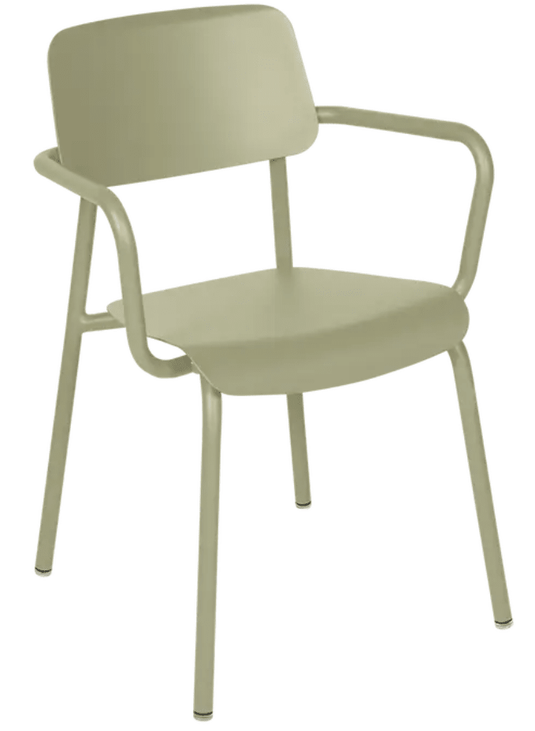 Willow green Fermob Studie armchair, stackable indoor dining and office chair with modern design and sturdy metal frame.