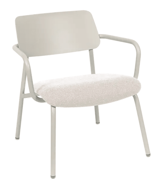 Fermob Studie Fabric Lounge Armchair with metal frame, shown as a stylish office chair in a contemporary setting.