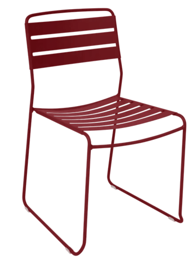 Load image into Gallery viewer, Bright red Fermob Surprising outdoor chair with a sleek modern design, suitable for restaurant or outdoor patio settings.
