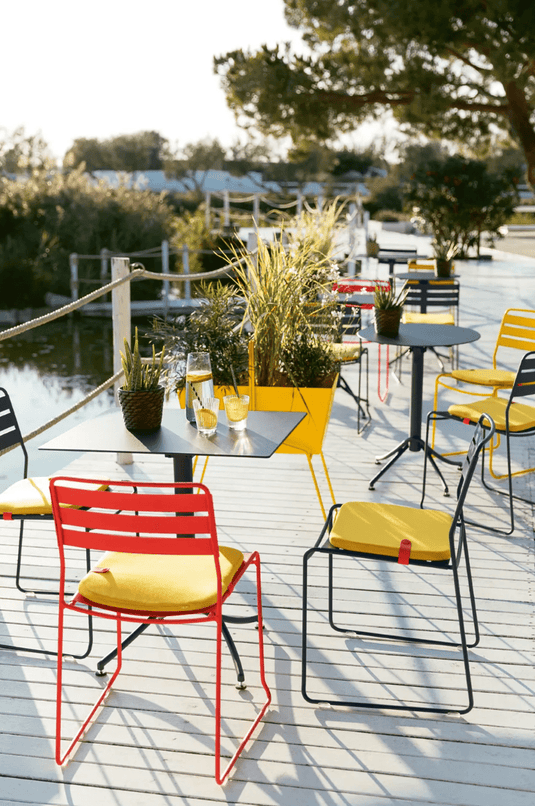 Fermob Surprising outdoor chair with colorful, modern design, suitable for patio or garden seating.