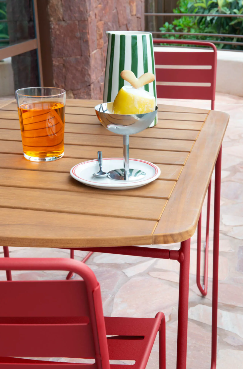 Load image into Gallery viewer, Fermob Surprising outdoor chair with colorful, modern design and curved metal frame, perfect for patio or garden seating.
