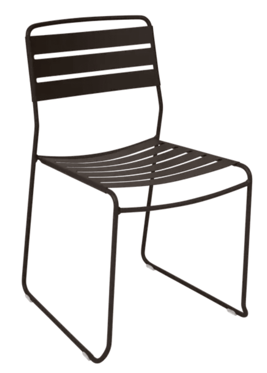 Fermob Surprising outdoor chair with vibrant yellow finish, featuring a curved backrest and sleek metal design for outdoor dining.