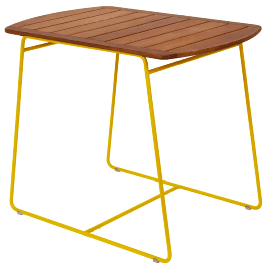Fermob outdoor teak table, 90x60cm, with honey-colored wood finish, designed for outdoor dining and patio use.