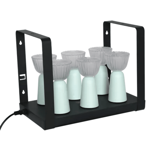 Set of six Fermob Swing lamps in ice mint color with a charging tray, rechargeable outdoor lighting for patio or garden.