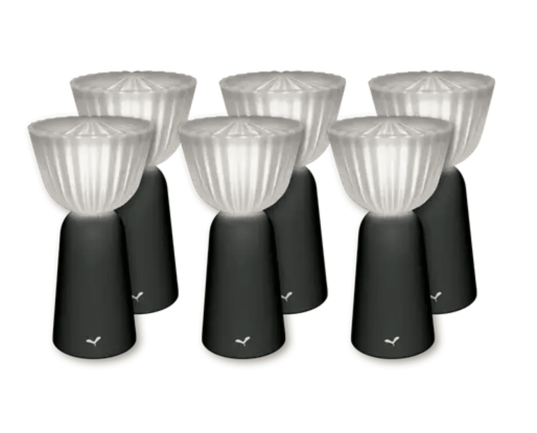 Load image into Gallery viewer, Set of six Fermob Swing outdoor rechargeable lamps in antracite, 20 cm height, arranged outdoors for ambient lighting.
