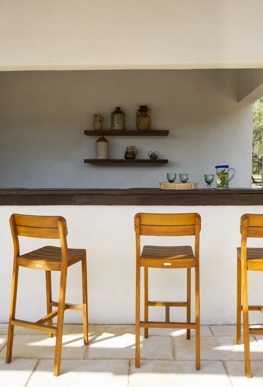 Teak LODGE bar stool by Custom Wood Designs, outdoor restaurant seating with natural wood finish and sturdy design.